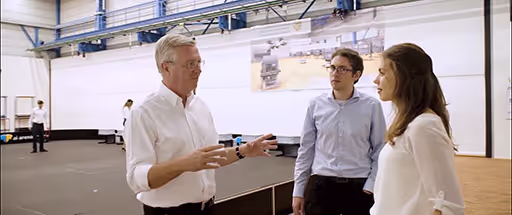 A still from a Fraunhofer IML Video showing scientists at work in the TU Dortmund FLW demonstration hall